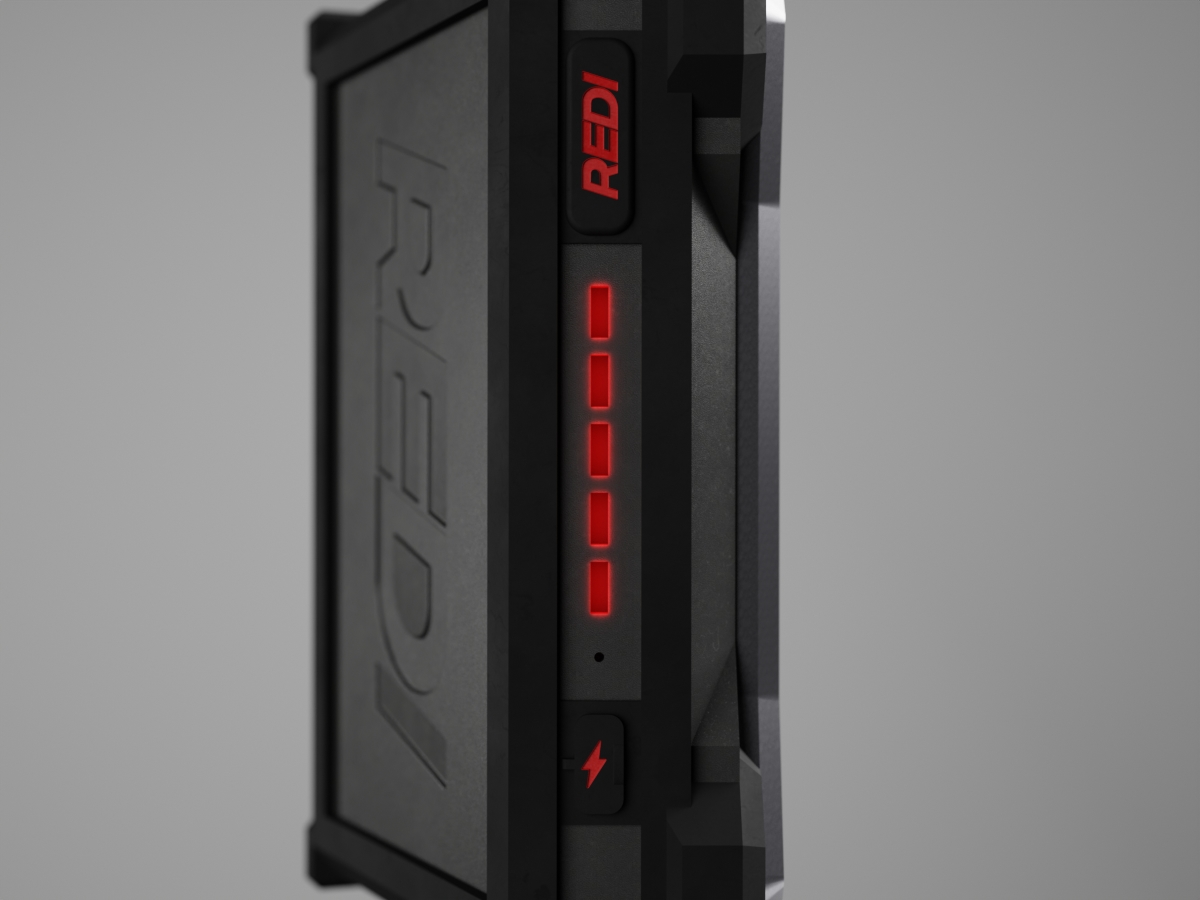 A close up of the power button, visual progress bar timer and charging indication light and port on the REDI device