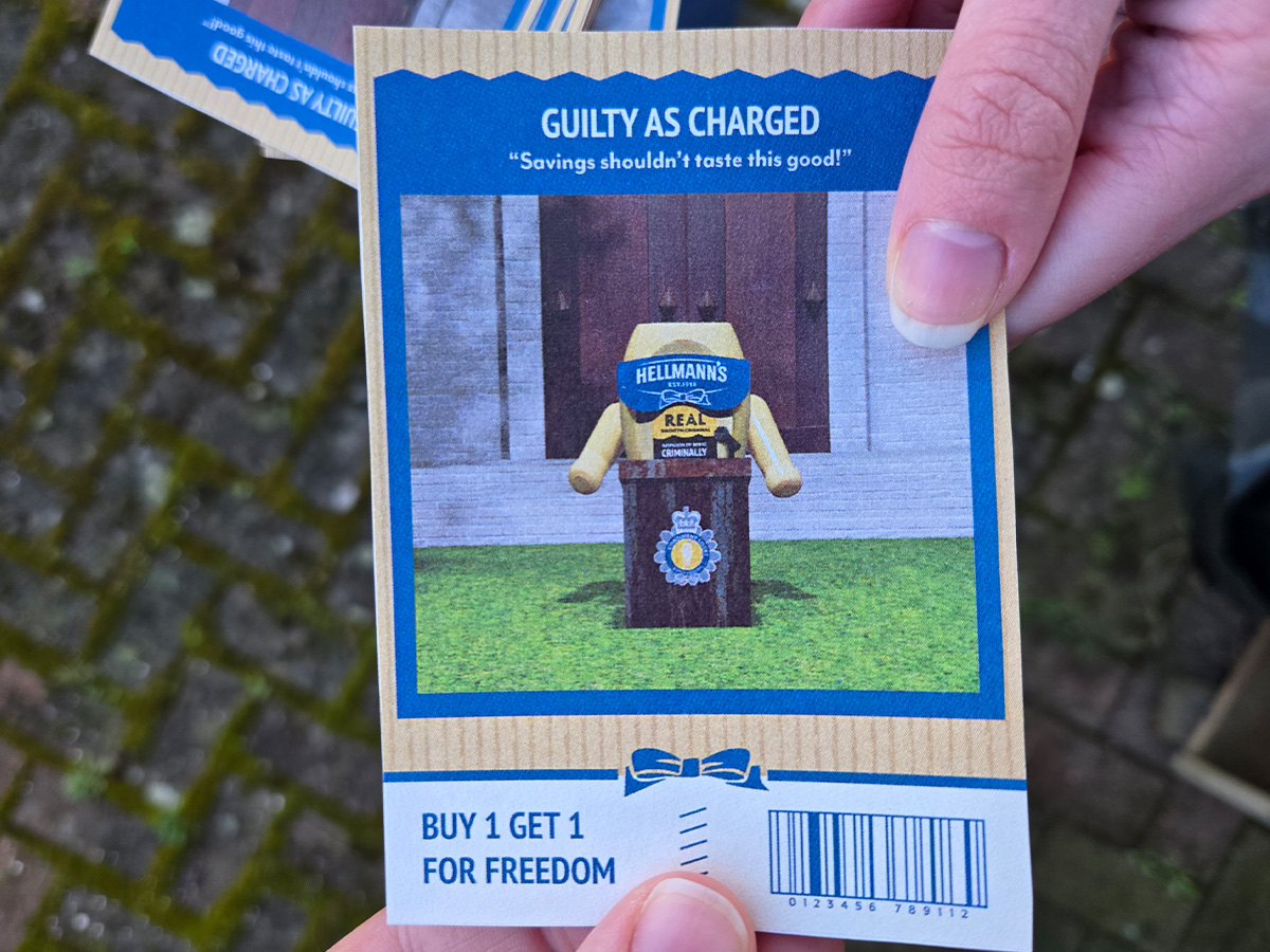 Person handing a buy one get one free to another person.