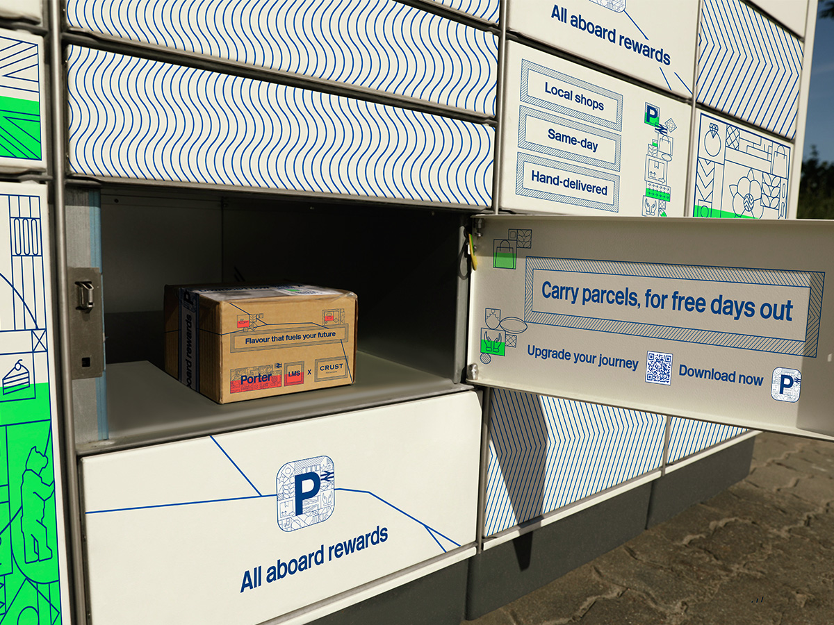 Porter branded parcel locker with door open and parcel within.
