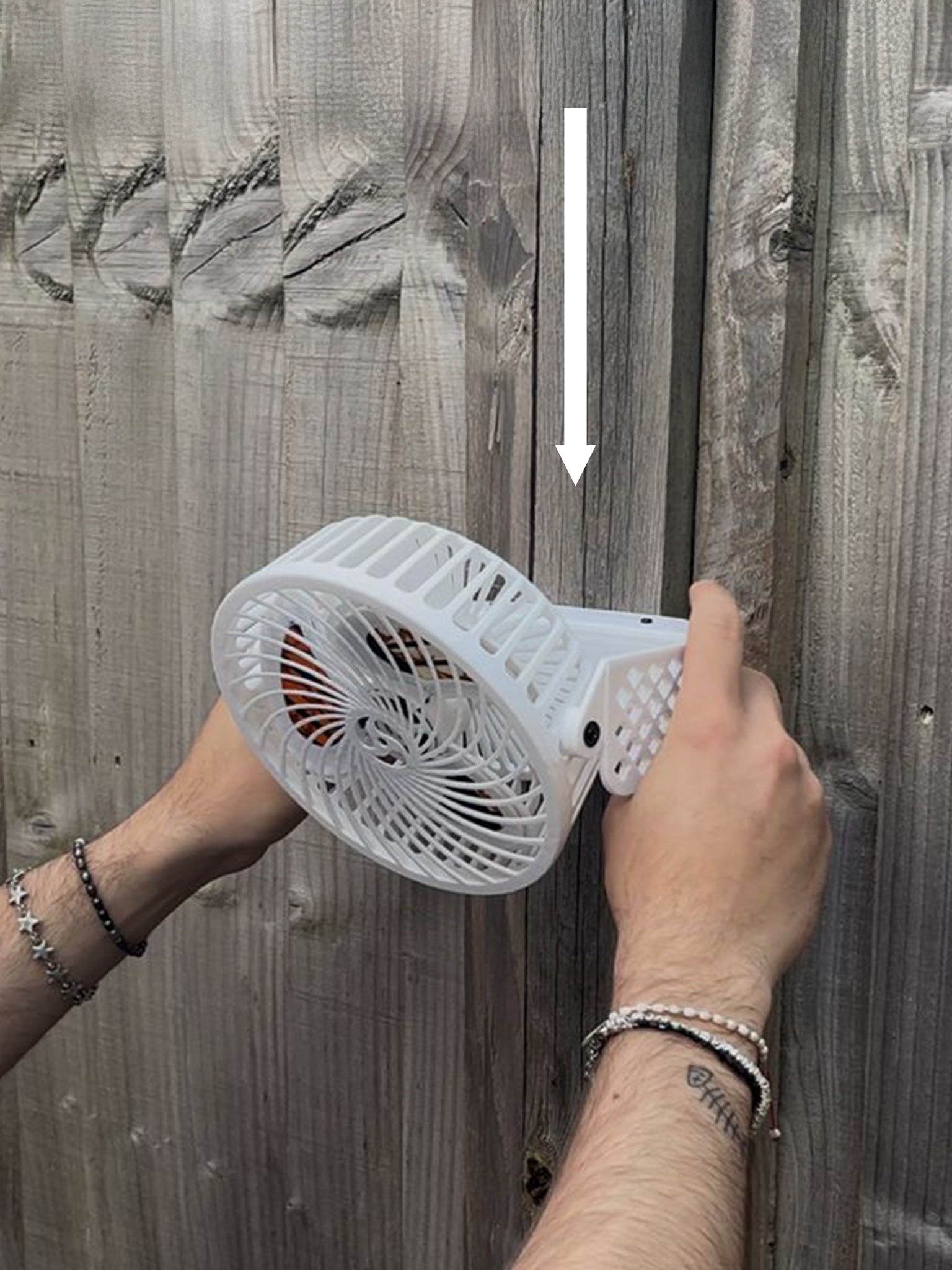 Fan attached to wall